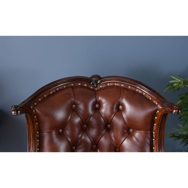 A fine quality Leather Arm Chair from Niagara furniture featuring a solid mahogany frame and full grain genuine leather....