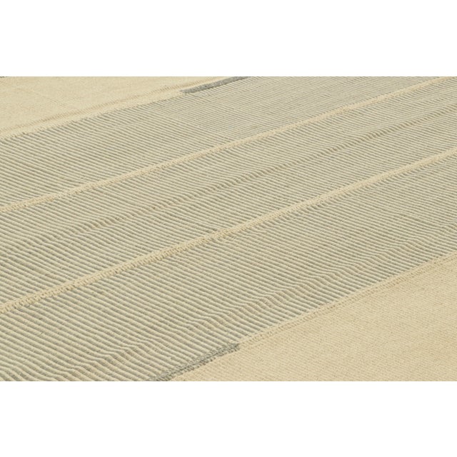 Handwoven in wool, this 9x11 Kilim is from an inventive new contemporary flat weave collection by Rug & Kilim. On the...