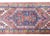 A beautify early 20th century Persian Mazlaghan rug with a tribal pattern containing stylized flowers and scrolling vines,...