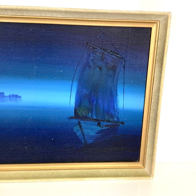 This is a striking original vintage oil painting, featuring a minimalist sailboat with a distant city skyline, rendered...
