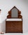 This piece presents as a chest of drawers, distinguished by dark mahogany, turned wood knob. The piece dates to 19th...