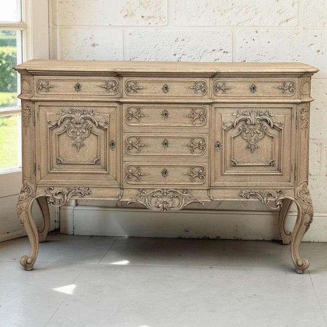 Exceptional antique Liège buffet crafted from solid oak, with a beautifully stripped finish that reveals the natural...