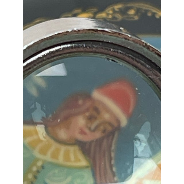 This authentic Mstyora lacquer miniature depicts the "Metelitsa" (Snowstorm) theme, a classic of Russian folklore. Hand-...