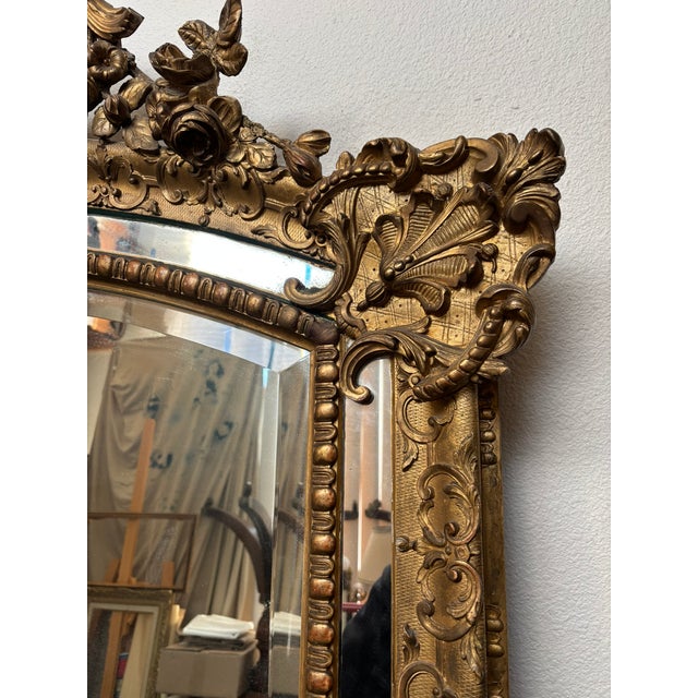 From a grand Parisian townhouse this large scale French Regence~style mirror is an impressive focal point that will add...