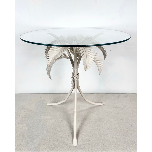 Vintage metal palm tree accent table. 3 leg round pedestal table with metal tole palm fronds. 20" round glass top. Perfect...