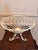 Decorative vintage heavy wirework pedestal basket in painted cream/white metal with elegant scrolling details and tripod...