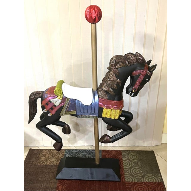 This vintage, hand-carved, wooden carousel horse is very well made. The base is extremely sturdy, with the piping running...