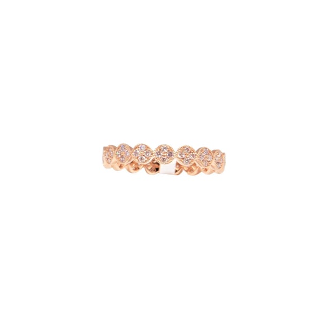 This band features 68 diamonds weighing 0.58 ct and set in 18k rose gold. A great ring to add to any jeweler's collection.