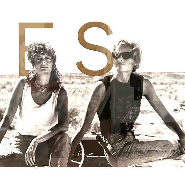 Official Poster for the 1979 Cannes Film Festival featuring an image of Thelma & Louise , a beloved US film . In gold...