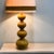 A striking 1970s kaiser leuchten lamp in a deep mustard-ochre glaze, featuring a sculptural stacked-sphere ceramic base...