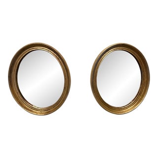 Pair of Vintage Gilt Oval Italian Mirrors For Sale