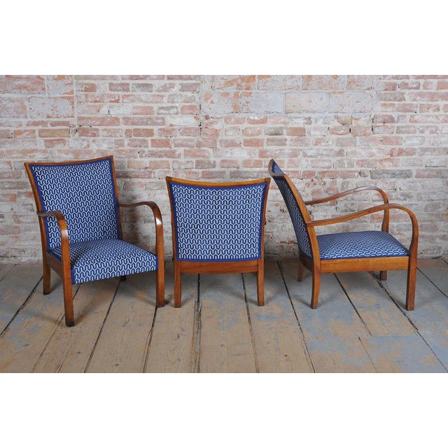 This exclusive set of three armchairs in the distinct Art Deco style dates from the 1920s in Czechoslovakia. The primary...