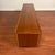 Stunning vintage mid-century long teak sideboard by Robert Heritage for Archie Shine featuring an upturned back edge,...