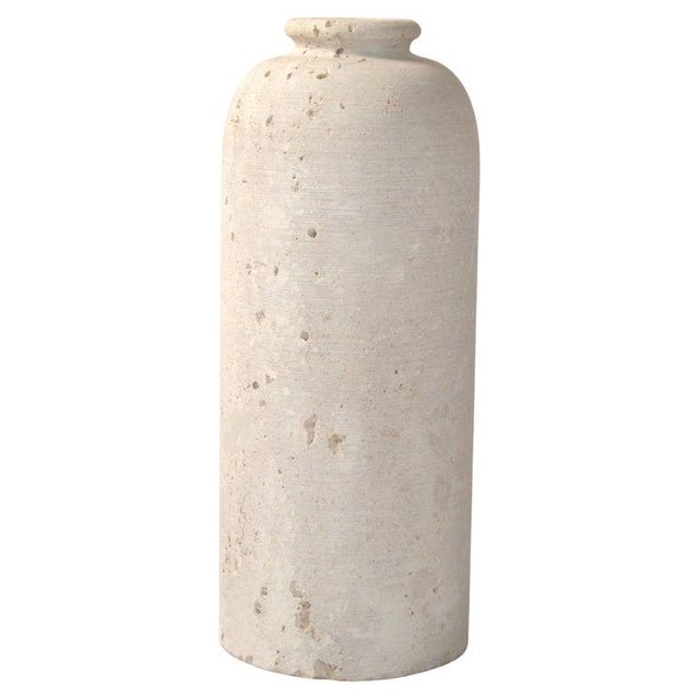 The Italian Classic Riven Travertine Venice Bottle Shaped Vase attributed to Fratelli Manelli for Raymor is a versatile...