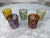 Add a vibrant touch of Japanese craftsmanship to your bar cart with this stunning set of five "cut-to-clear" crystal...