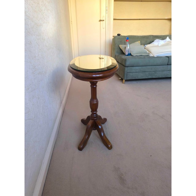 Beautiful Louis Philippe-style wooden pedestal table with a beautiful beveled mirror top. The mirror has a scratch or two...