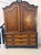 A fine and richly decorated antique Dutch walnut linen press, constructed in the late 18th century and extensively inlaid...