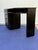 1940’s Ebonized desk designed by Eliel Saarinen for Johnson Furniture Co. The side of the wood drawer handles are painted...