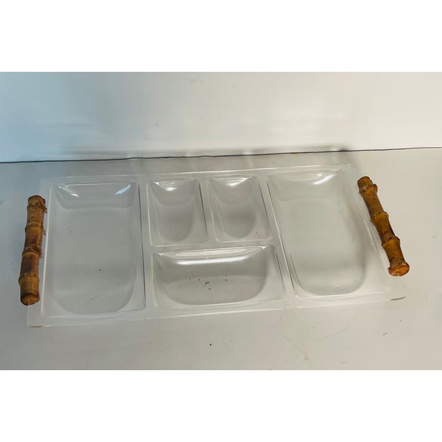 Vintage mid century modern acrylic tray with real bamboo handles.
