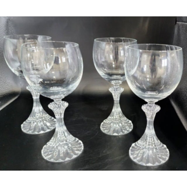 Stunning set of 4 vintage glasses, new but w/o their original box. Each glass is 6.5" tall, and this discontinued pattern...