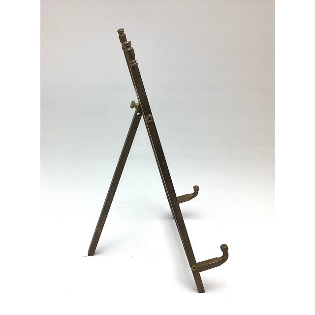 Vintage Brass Table Top Easel. This easel is in wonderful condition. You can adjust and tighten how far back you want your...