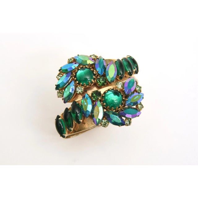 This is part of Chairish’s Costume Jewelry assortment. Stunning colors of greens and turquoise of the Aurora Borealis...