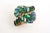 This is part of Chairish’s Costume Jewelry assortment. Stunning colors of greens and turquoise of the Aurora Borealis...