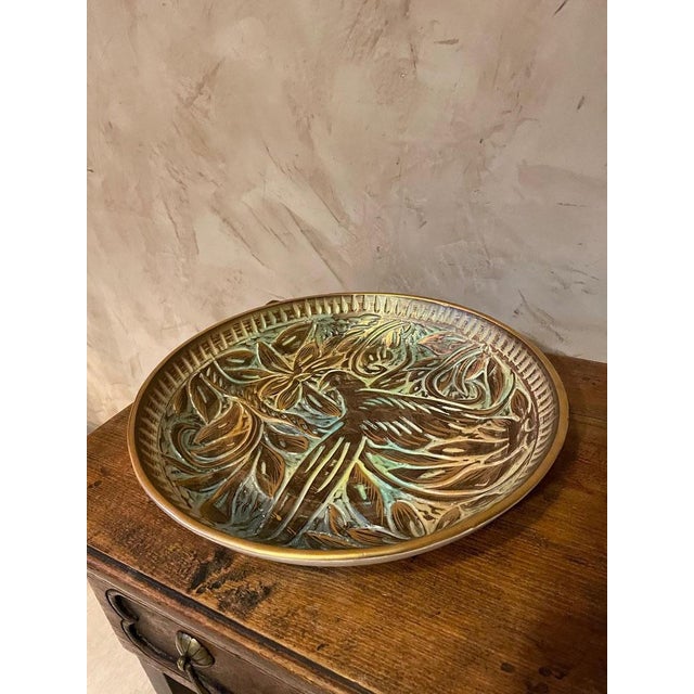 Very beautiful dish made by hand in ceramic in the 1940s by the Belgian ceramist Henri Bequet. Representation of a bird....