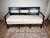 This substantial antique English three-seat bench dates to the late 19th century and has the straightforward, sturdy...