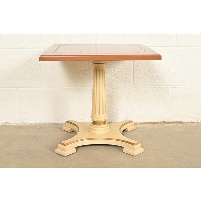 A gorgeous mid-century Hollywood Regency or Neoclassical style occasional side table or tea table By Mersman USA, Circa...