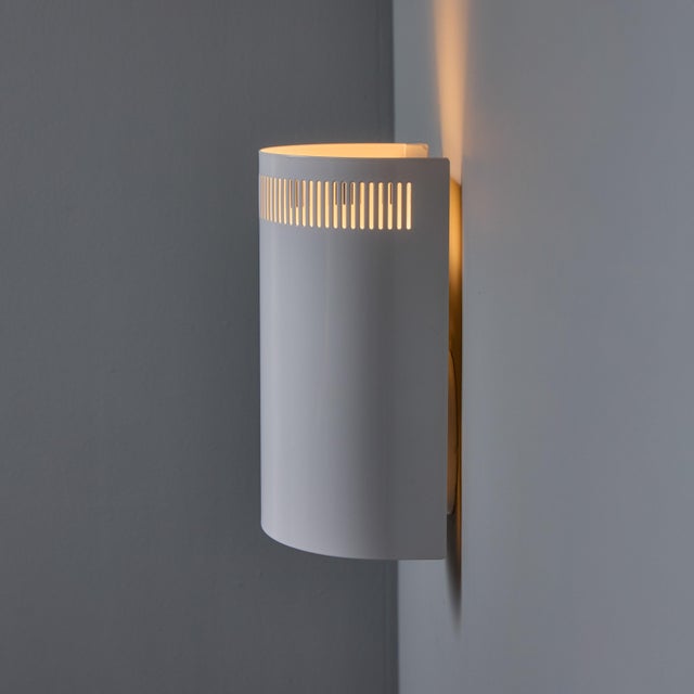 1960s Model #5390 White Perforated Metal Wall Lights for Orno Finland&nbsp; An architectural and minimalist design...