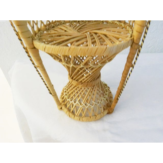 Charming vintage wicker plant stand in a fan chair design. Excellent condition.