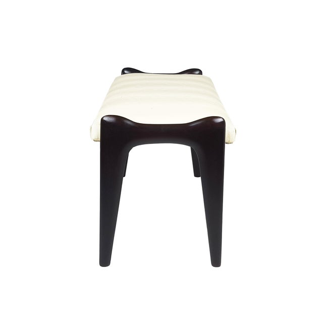 Pair of bedroom stools also usable as ottomans. Stained wood structure with cushioned seats upholstered in white ivory...