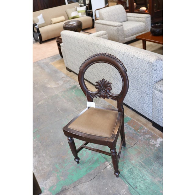 Indian rose wood dinning chair from India . We have re upholstered the seat in a linen fabric.