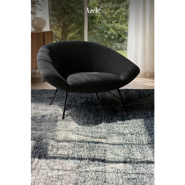 A gradient of soft light gray deepening into rich charcoal, crossed by fine ivory lines forming an elegant diamond trellis...