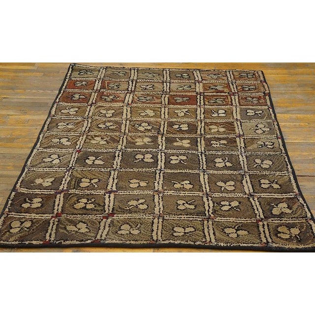 Hooked 1900s Small Scatter Size Wool American Antique Ivory Rug, Circa Date: 1900s. This charming piece represents the...