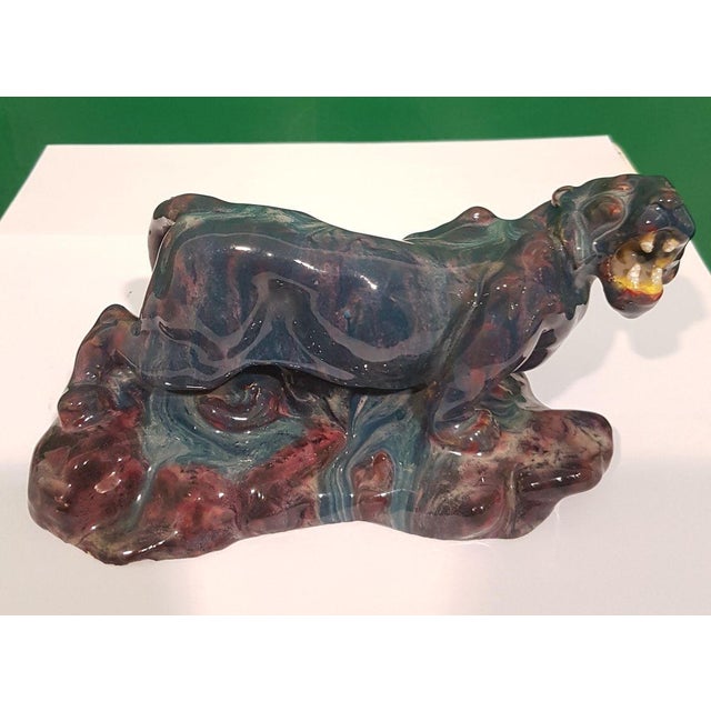 Ceramic sculpture representing a roaring black panther, by Italian artist Ceramist Bernardino Palazzi (1907-1986)....