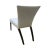 This is the Sevilla Chair by Brueton. It is upholstered in a cream fabric with dark maple legs.