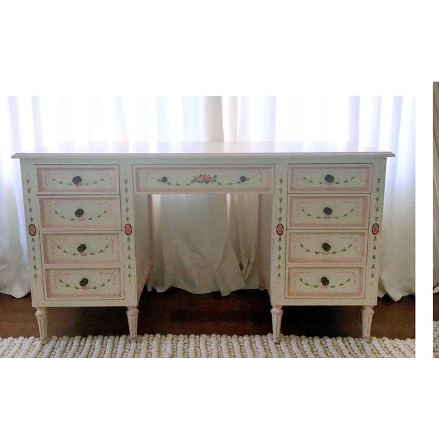 A charming and highly decorative hand-painted desk by Julia Gray, beautifully handcrafted in a soft cream custom finish...