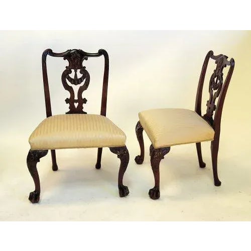 A very nice pair of early George III style mahogany side chairs made in England during the last quarter of the 18th...