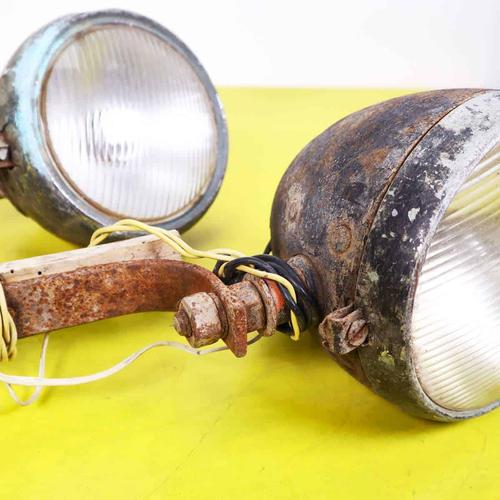This charming pair of vintage task lamps features a sturdy metal design, perfect for adding an industrial touch to any...