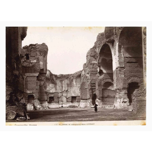 Baths of Caracalla is a vintage sepia photograph realized by Ludovico Tuminello in the early 20th Century. Titled on the...