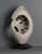 Prodrome features a striking portrait that captures a moment of introspection, with the subject's face partially shrouded...