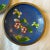 Lovely pair of vintage cloisonné dishes with a deep blue enamel surface and floral pattern.