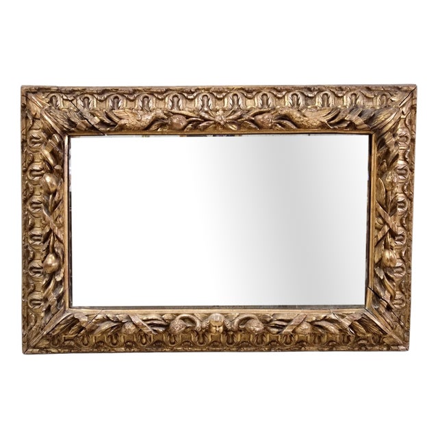 18th Century Mirror in Carved Gilt Wood Decorated with Birds, Fruit and Cherub, 1780 For Sale
