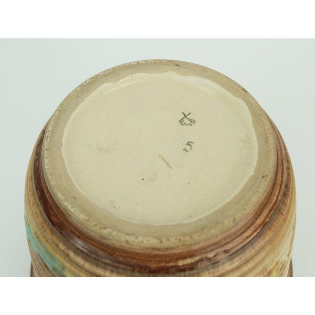 Rare large 1930s ceramic plant pot with multicolor drip glaze on beige and brown. Manufactured by Duemler & Breiden....