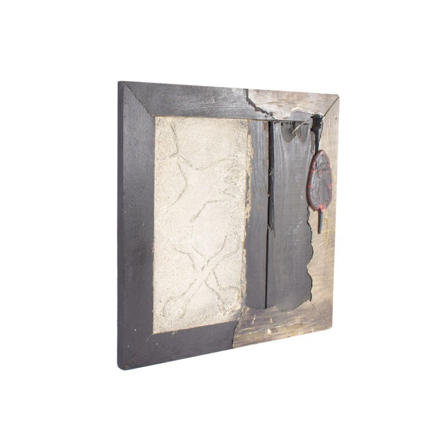 A found object wall assemblage by the American artist James Spencer Russell (1915-2000). This work uses different types of...