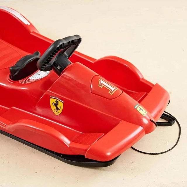 Item : A unique design object, perfect for young car enthusiasts. with its bright red color and Ferrari logo, it evokes...