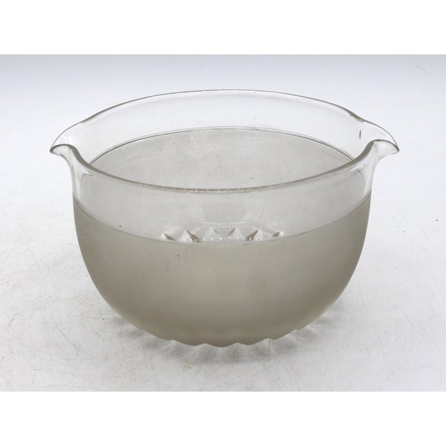 Circa 1840 English glass wine rinser. Blown, cut & frosted to clear glass. 5.75" dia. across rests, 3.25" h.