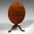 This is a wide antique tilt-top table. An English, mahogany reception hall or breakfast table, dating to the Georgian...